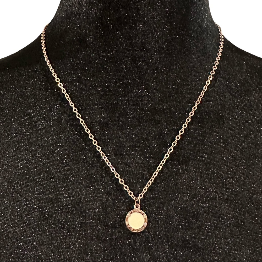 GUESS Los Angeles Pendant Necklace Gold Tone Rhinestone Detail